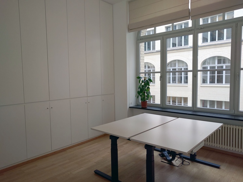 Bright 4 room office space with high ceilings to share on Oranienplatz