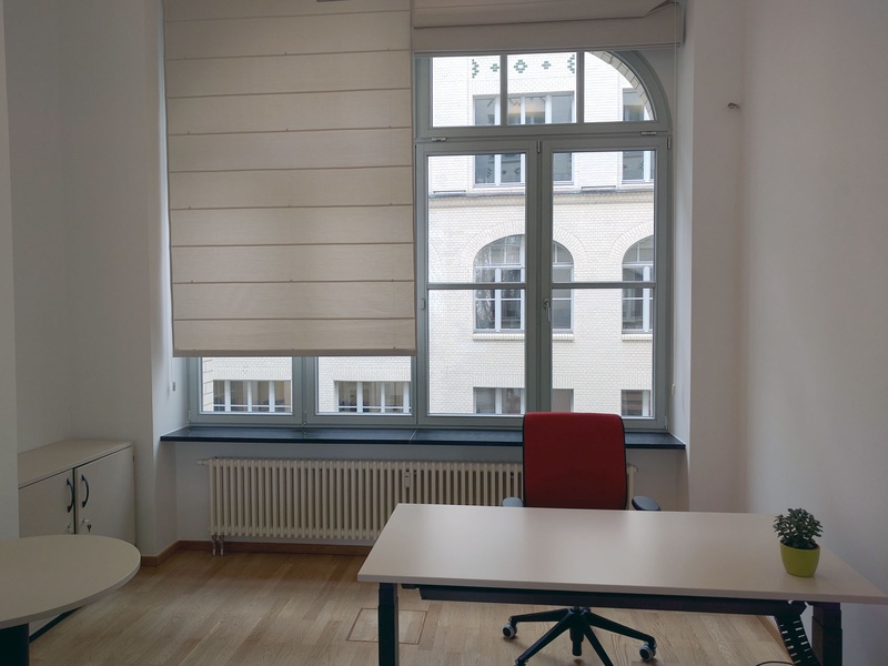 Bright 4 room office space with high ceilings to share on Oranienplatz