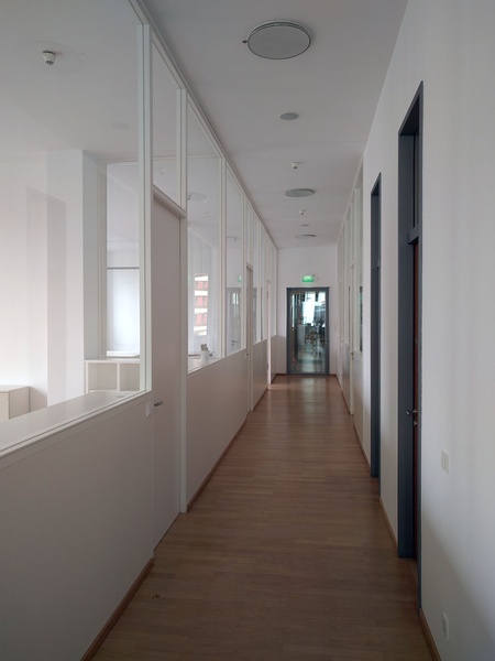 Bright 4 room office space with high ceilings to share on Oranienplatz