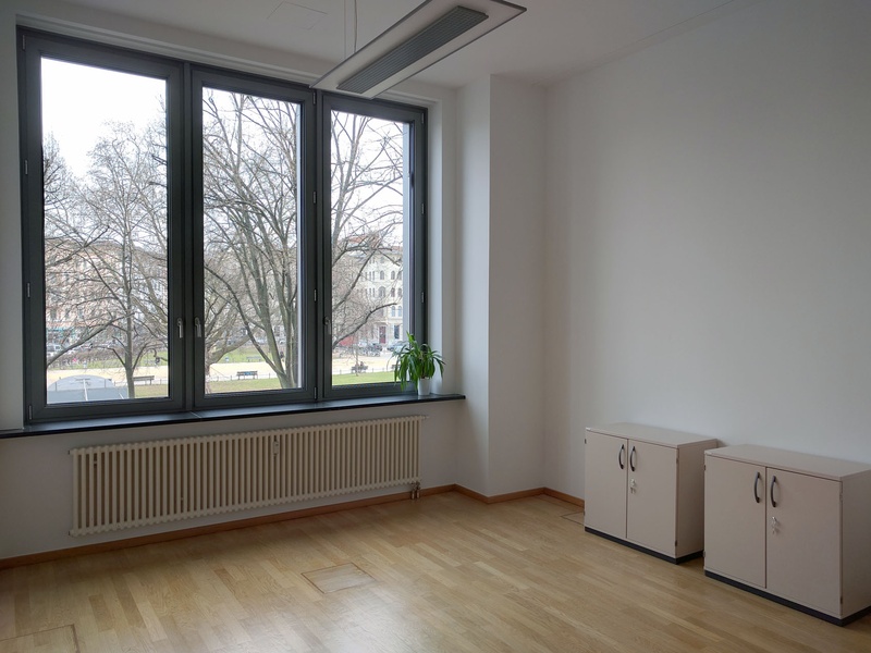 Bright 4 room office space with high ceilings to share on Oranienplatz